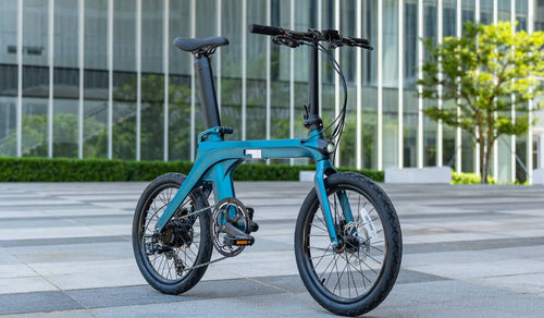 Electric bicycle Fiido X presented in an urban environment.