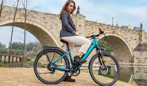 A woman riding a Fiido C11 electric bicycle