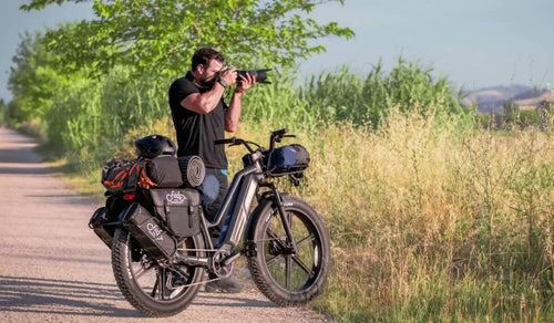 A man temporarily parked his Fiido Titan electric bike on the side of the road.