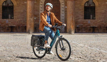 A man riding a Fiido C11 Pro electric bike