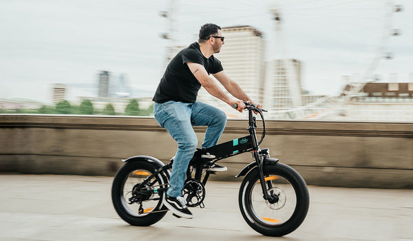 A man riding a Fiido M1 Pro electric bike