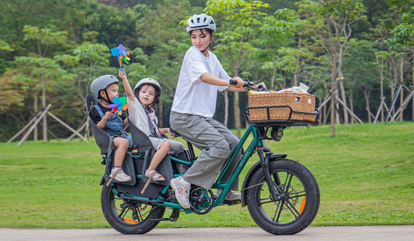 A mother carries her child on a Fiido T2 Longtail Cargo E-bike for a spring trip.