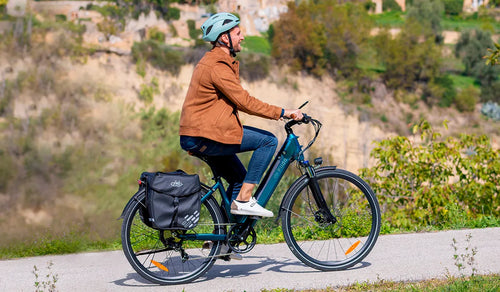 A man riding a Fiido C11 Pro electric bicycle on his way to work.