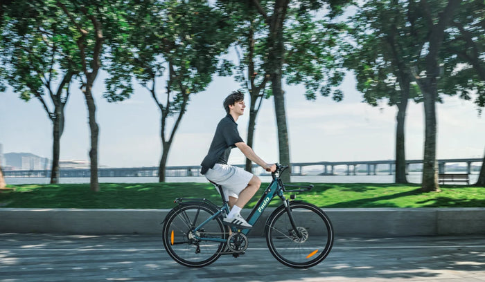 A man commutes on a Fiido C11 Pro urban commuter e-bike.