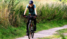 A man riding the Fiido C21 electric bike to exercise.