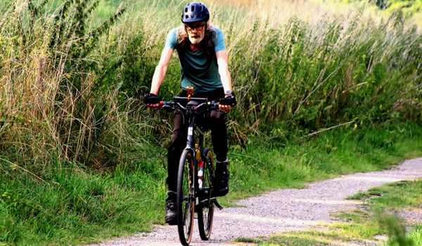 A man riding the Fiido C21 electric bike to exercise.