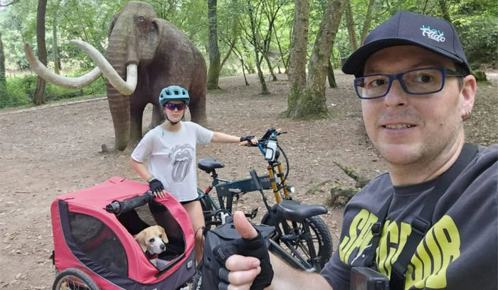 A couple is enjoying a ride in the park on the FIIDO M1 Pro electric bike and the Fiido Titan electric bike.