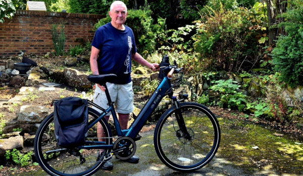 An elderly man owns a Fiido C11 Pro electric bike.