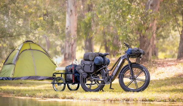 A Fiido Titan hunting electric bicycle is used for outdoor survival.