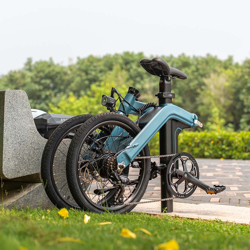 Fiido D11 Folding E-bike stands on the ground after folding